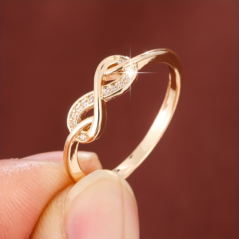 Golden Tone Infinity Symbol Ring with Zirconia Stones